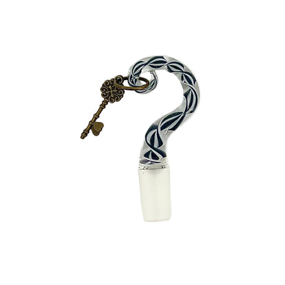 Decorative bottle stopper with twisted design on a white background