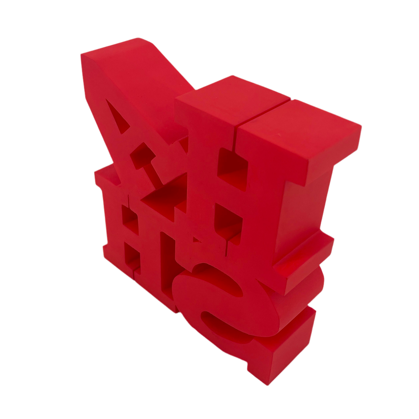 Red 3D letter sculpture on a white background.