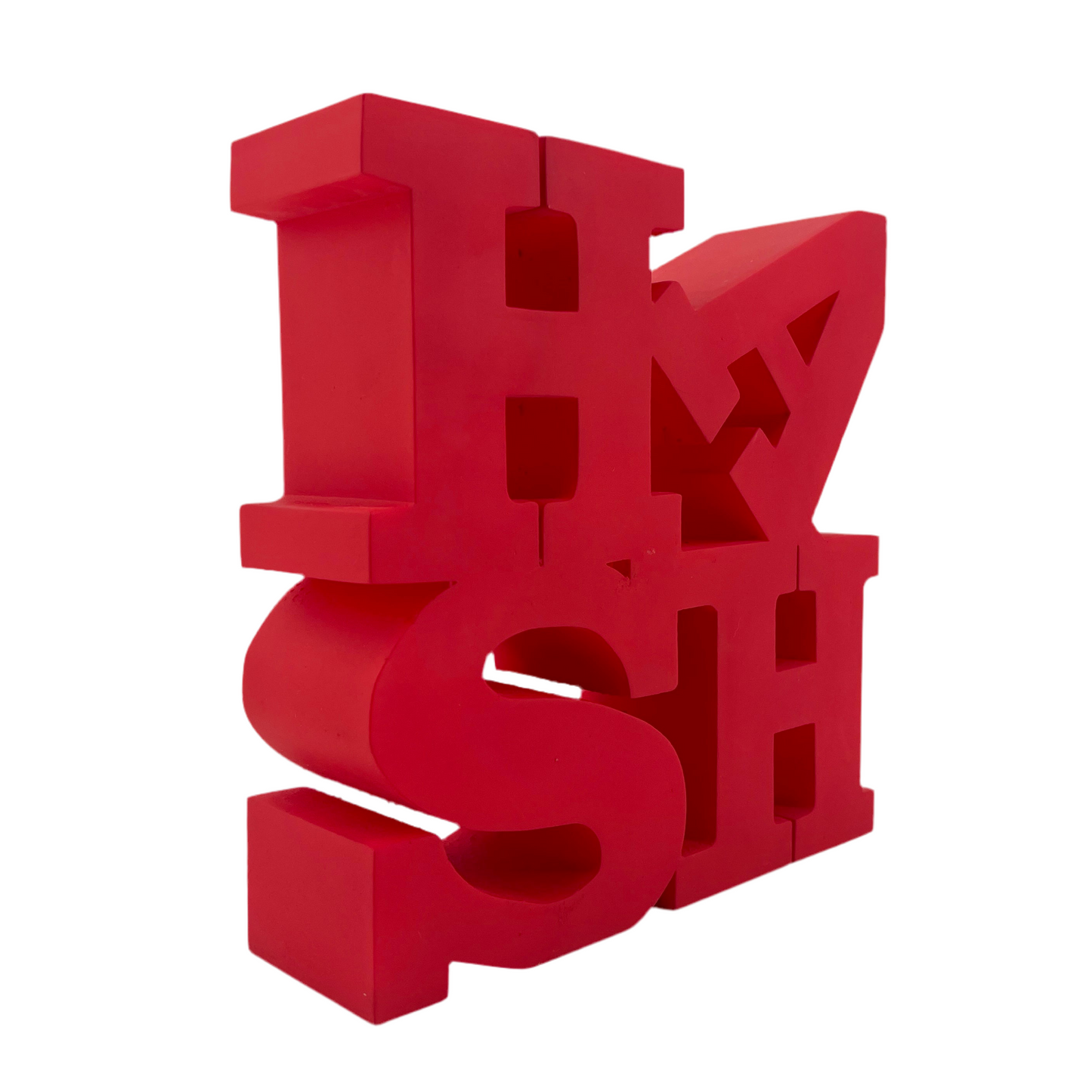 Red sculpture with abstract design on a white background.