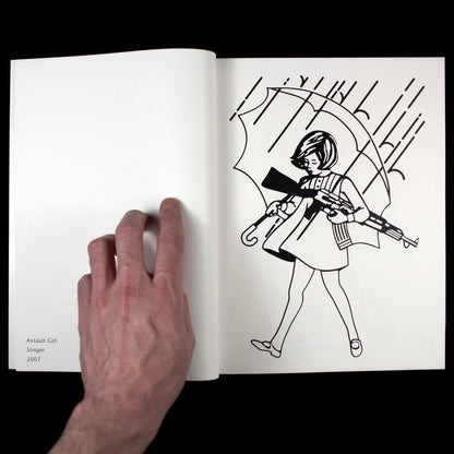 Open book with a black and white illustration of a woman holding a gun, being held open by a hand.