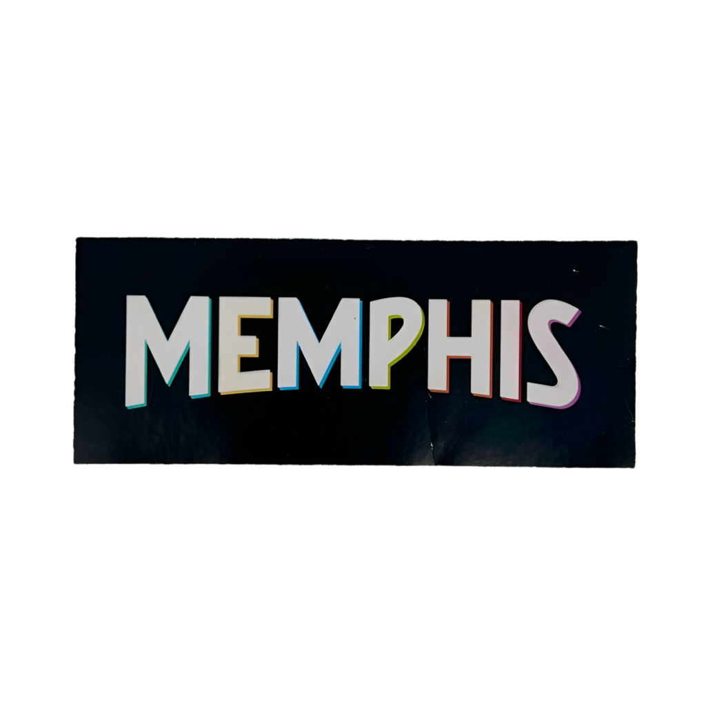 Sticker with 'MEMPHIS' text on a black background.