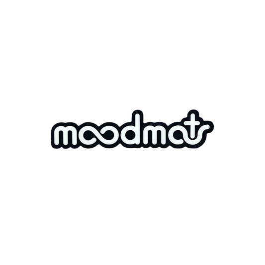 Black and white 'moodmat' sticker on a white background.