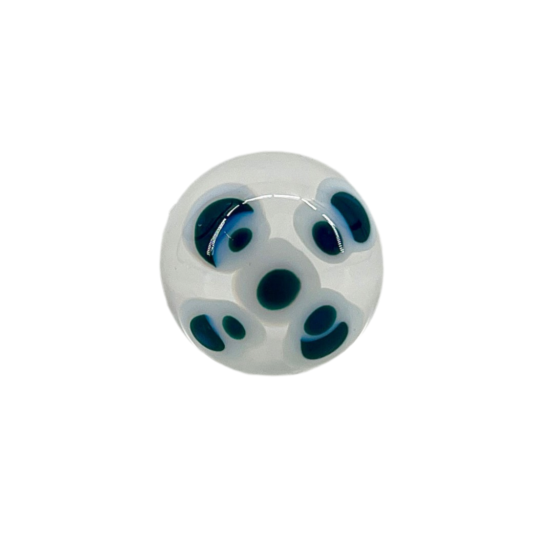 A multicolored glass marble with a design resembling a flower with blue petals on a white background, with a diameter approximately of 22mm.