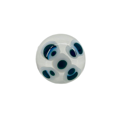A multicolored glass marble with a design resembling a flower with blue petals on a white background, with a diameter approximately of 22mm.