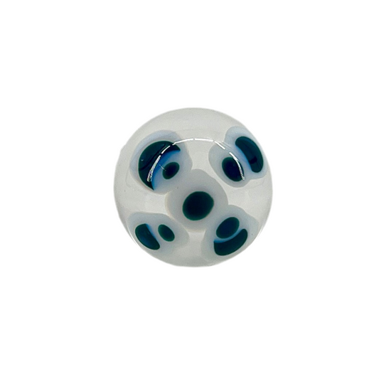 A multicolored glass marble with a design resembling a flower with blue petals on a white background, with a diameter approximately of 22mm.