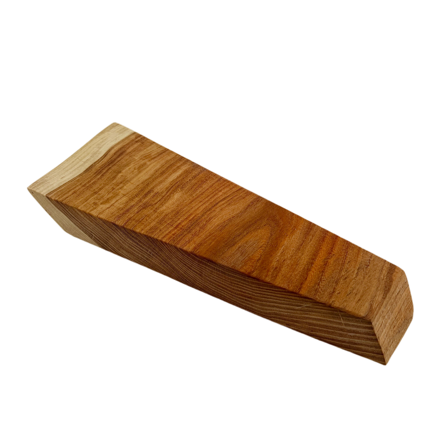 Wooden block with a striped pattern on a white background.