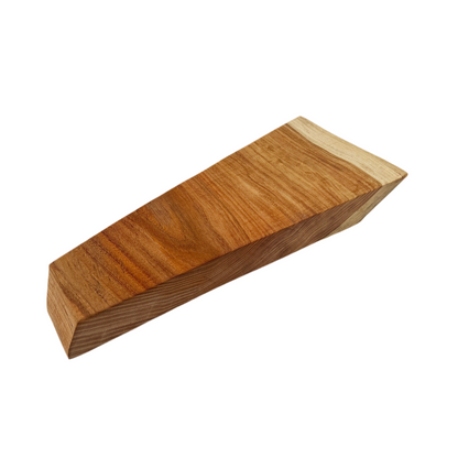 Wooden wedge block on a white background.