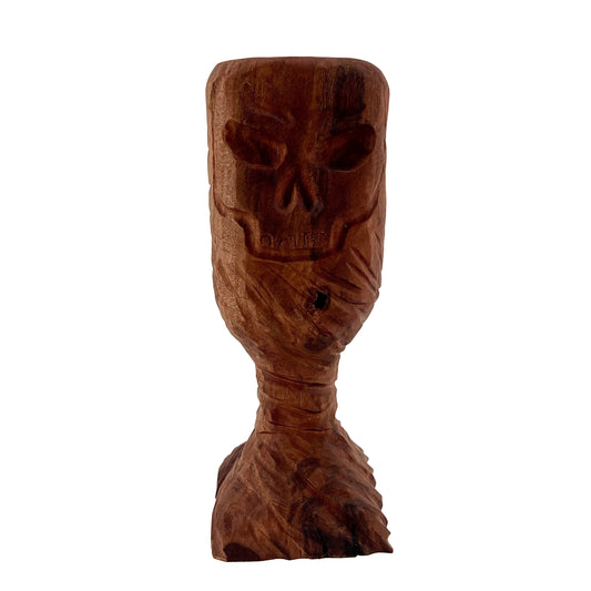 Wooden chalice with skull engraved.