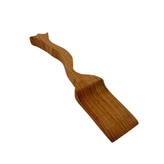 Wooden spatula on a white background.