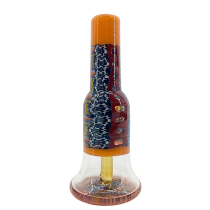 Glass mini tube with decorative pattern on a white background.