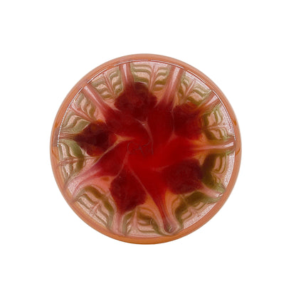Decorative glass base with a star-shaped design on a white background