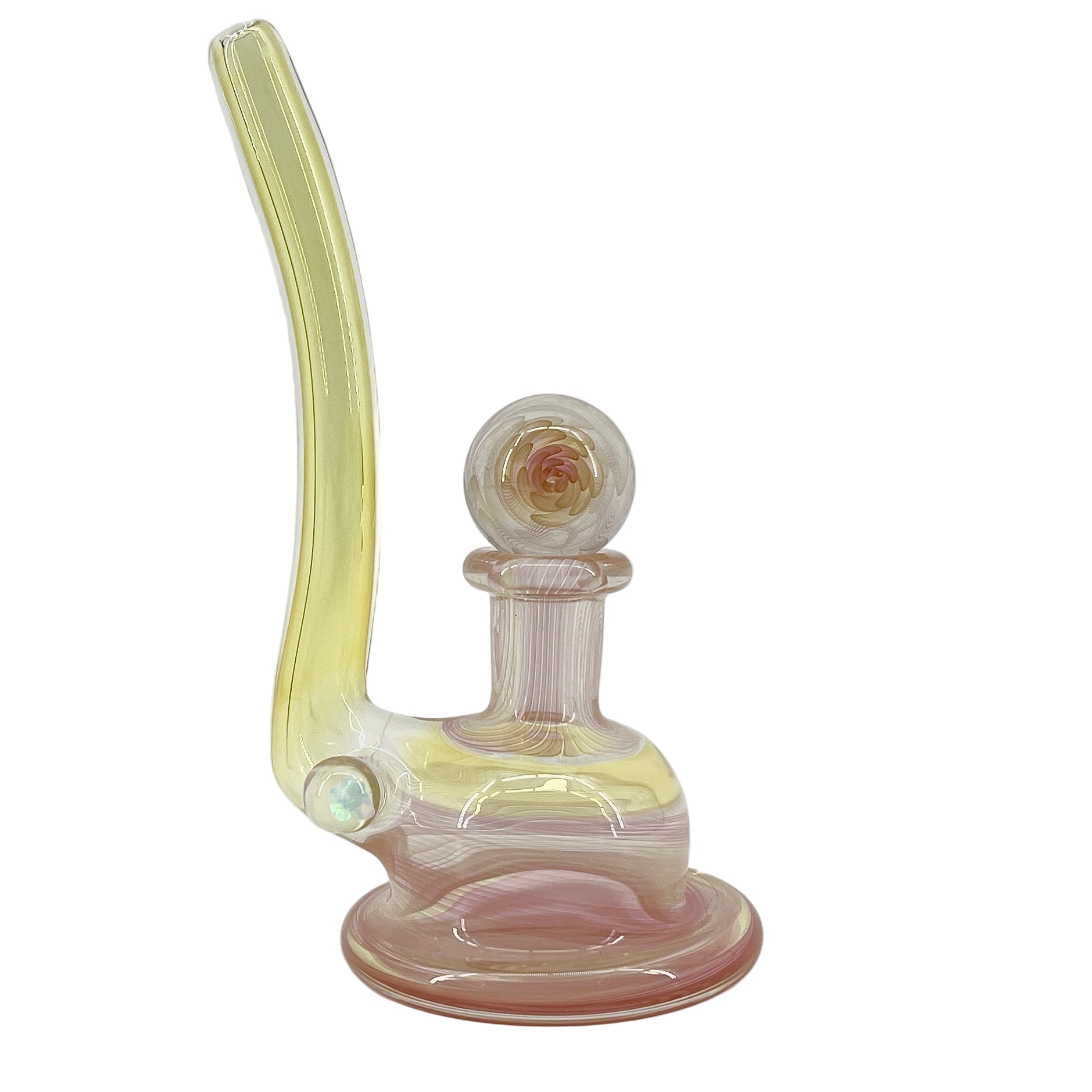 Glass smoking device with a yellow and pink design on a white background