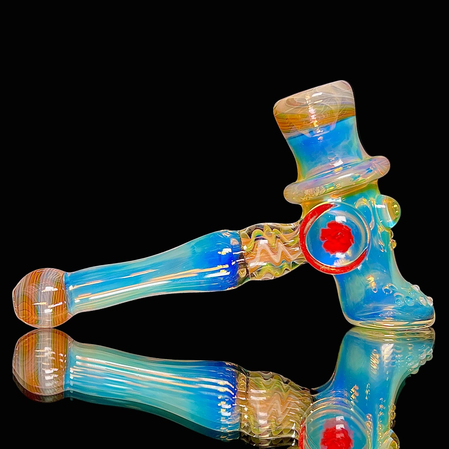 Fume skull hammer pipe on a black background.