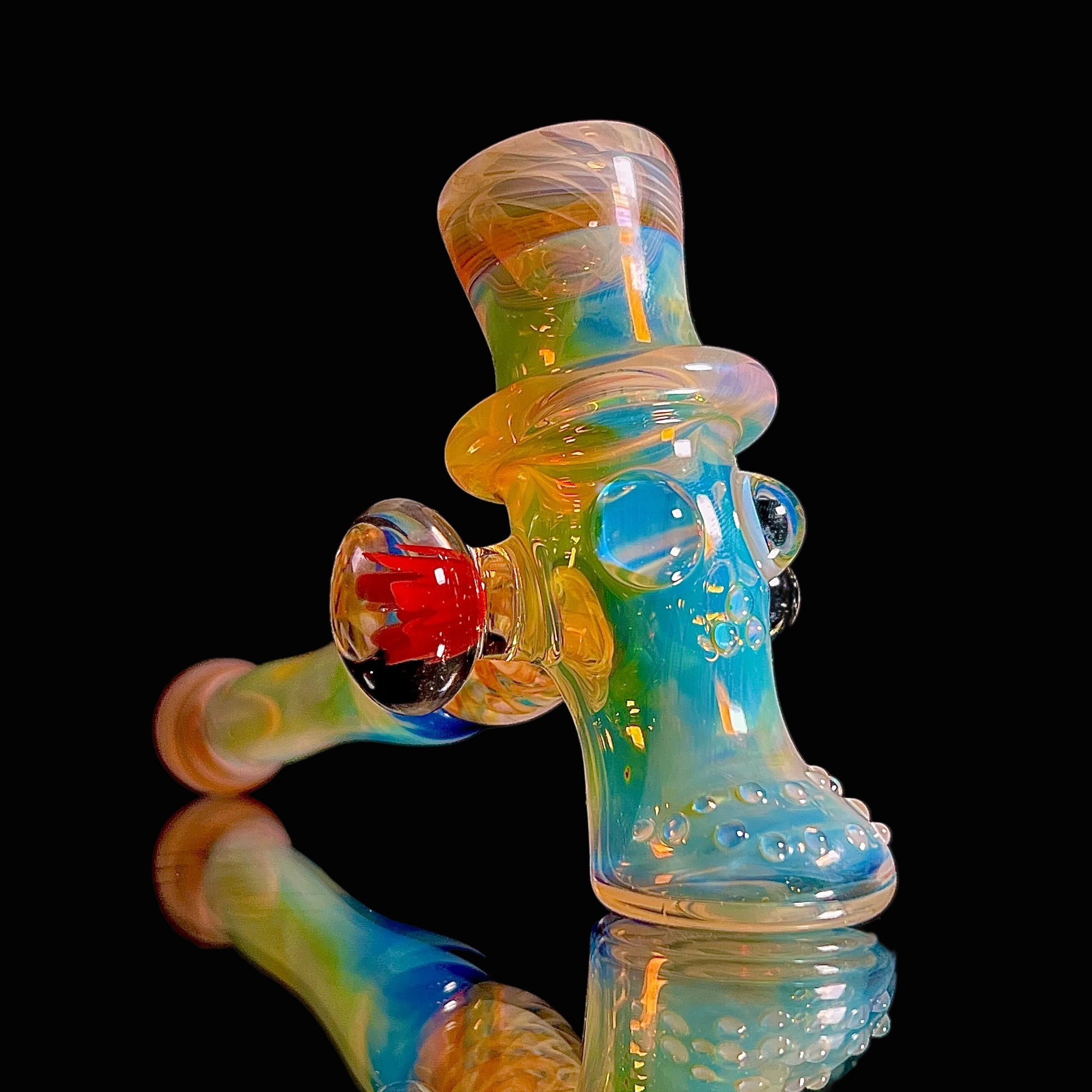 Fume skull pipe on a black background.