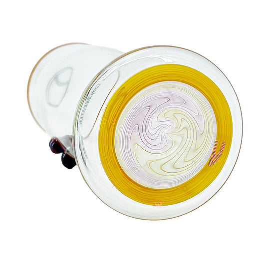 Clear glass cup with color accents on a white background.