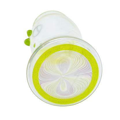 Clear glass cup with color accents on a white background.