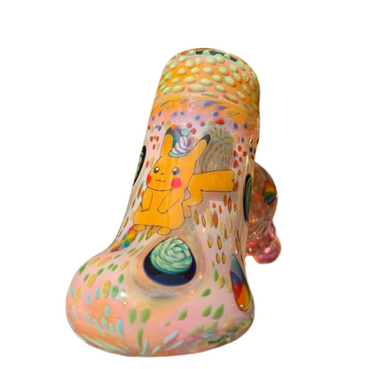 Colorful glass sculpture with a cartoon character on a white background.