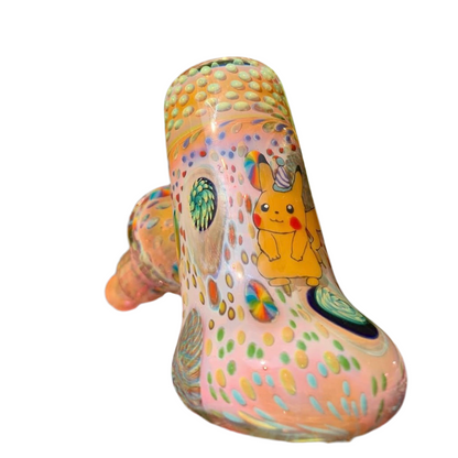 Colorful glass sculpture with cartoon characters on a white background.