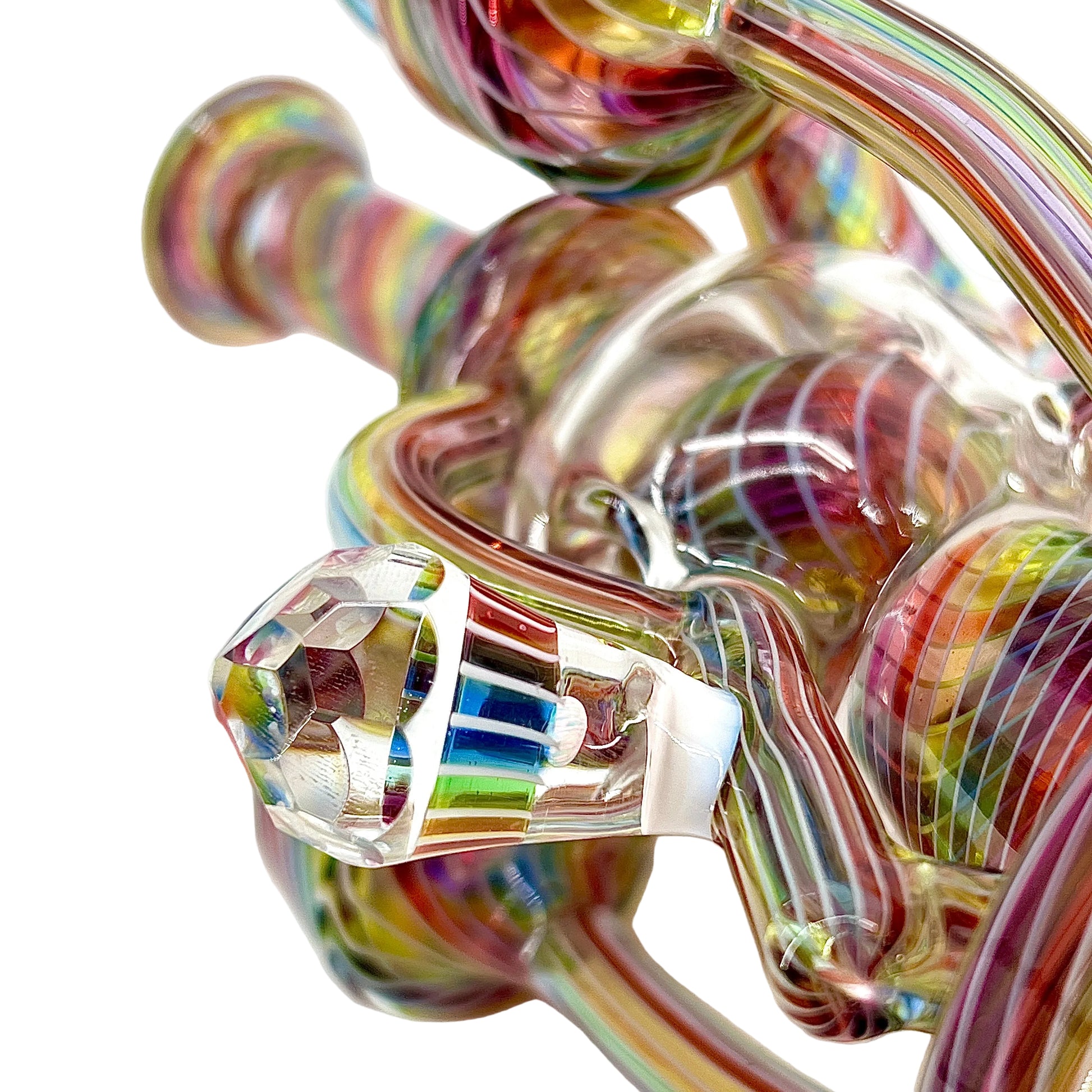 Multicolored glass pipe with a white background