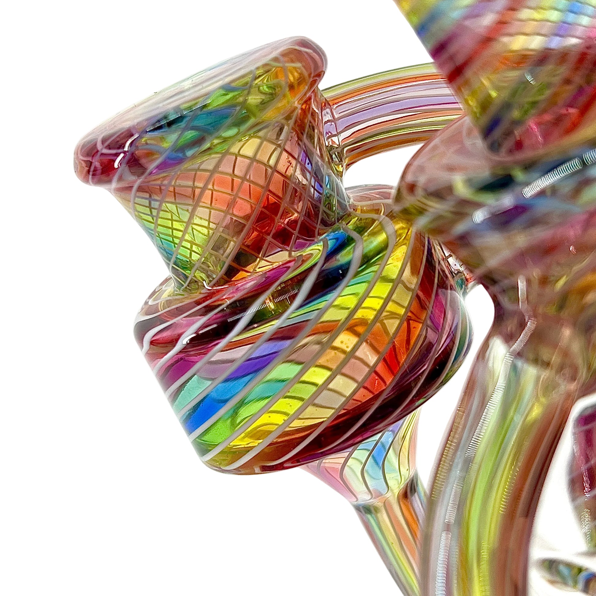 Colorful glass sculpture with a white background.