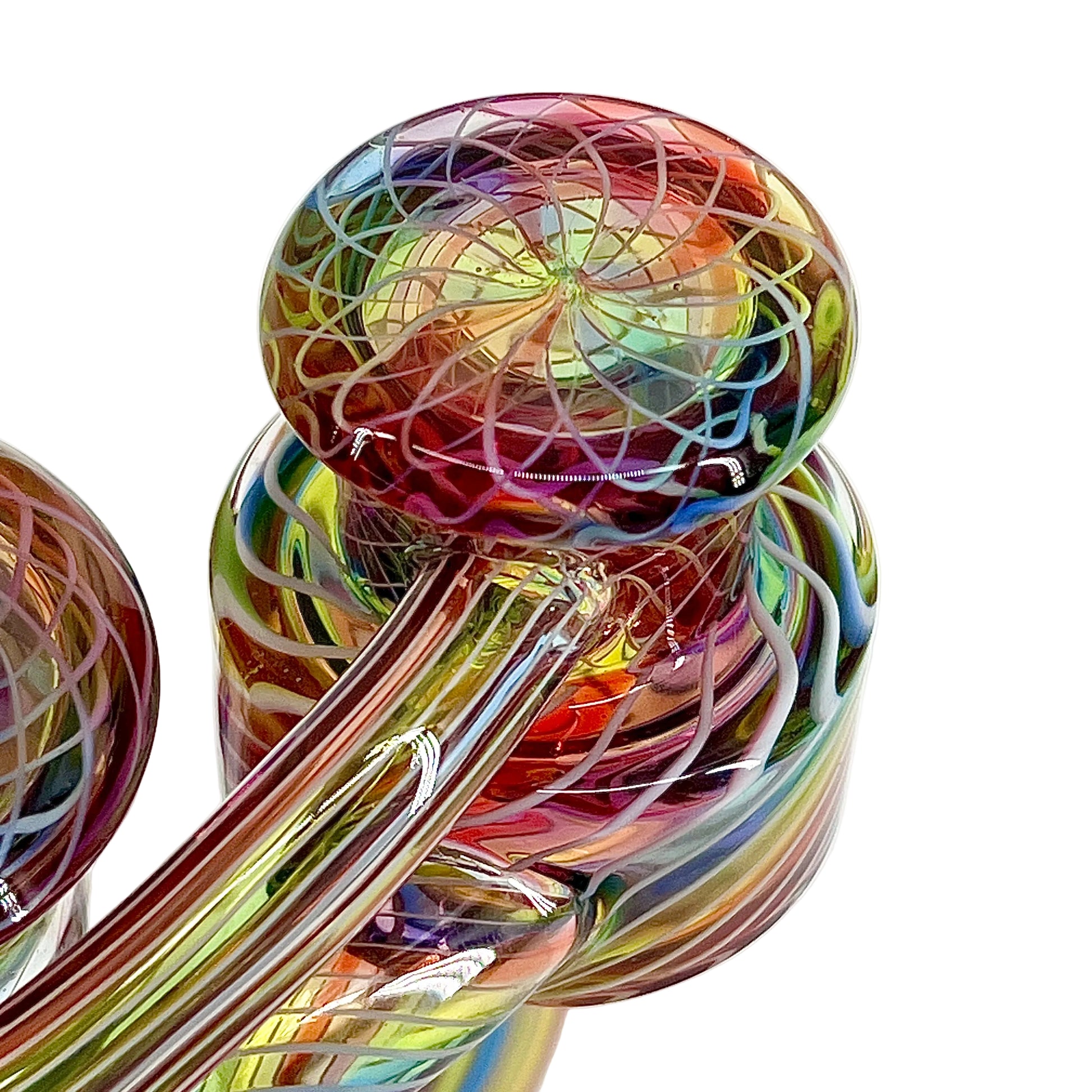 Multicolored glass sculpture with intricate patterns on a white background.