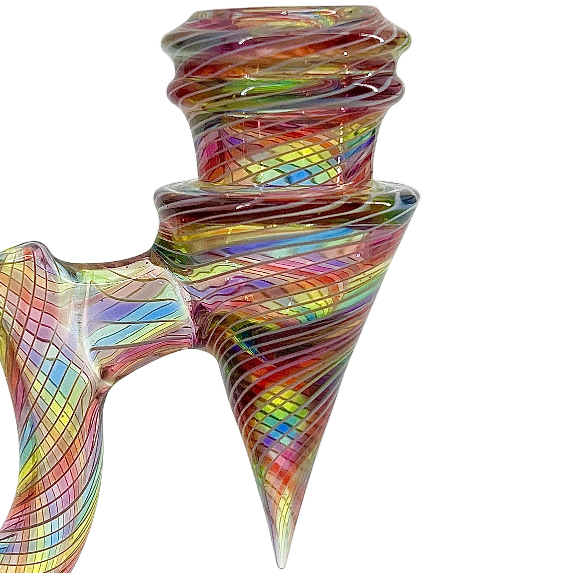 Colorful glass sculpture with swirling patterns on a white background.