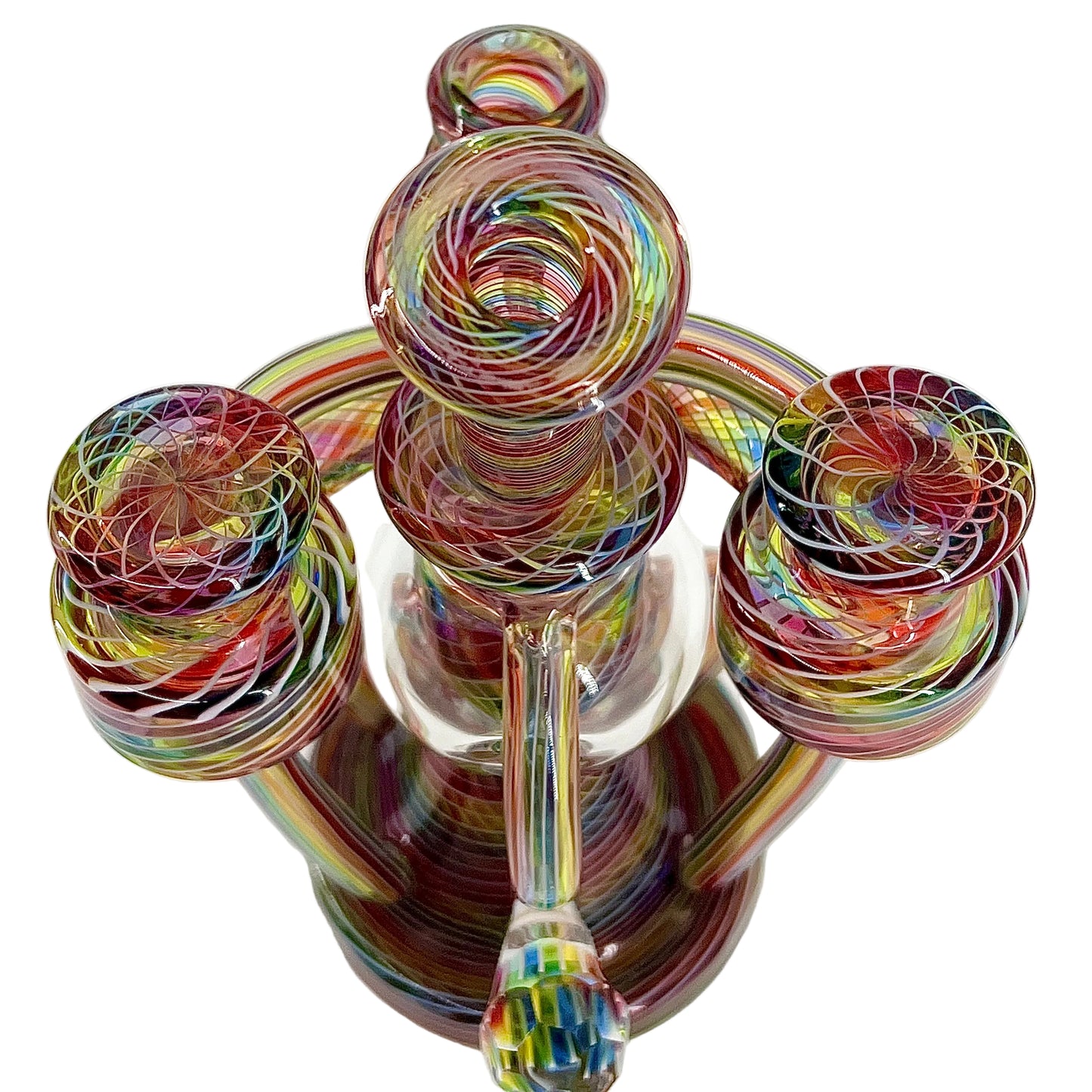 Multicolored glass sculpture on a white background.