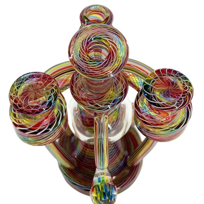 Multicolored glass sculpture on a white background.
