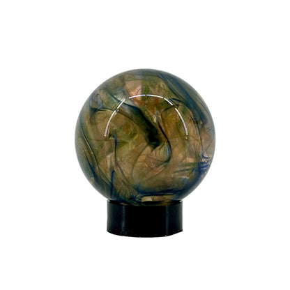 Decorative sphere with marbled design on a white background.