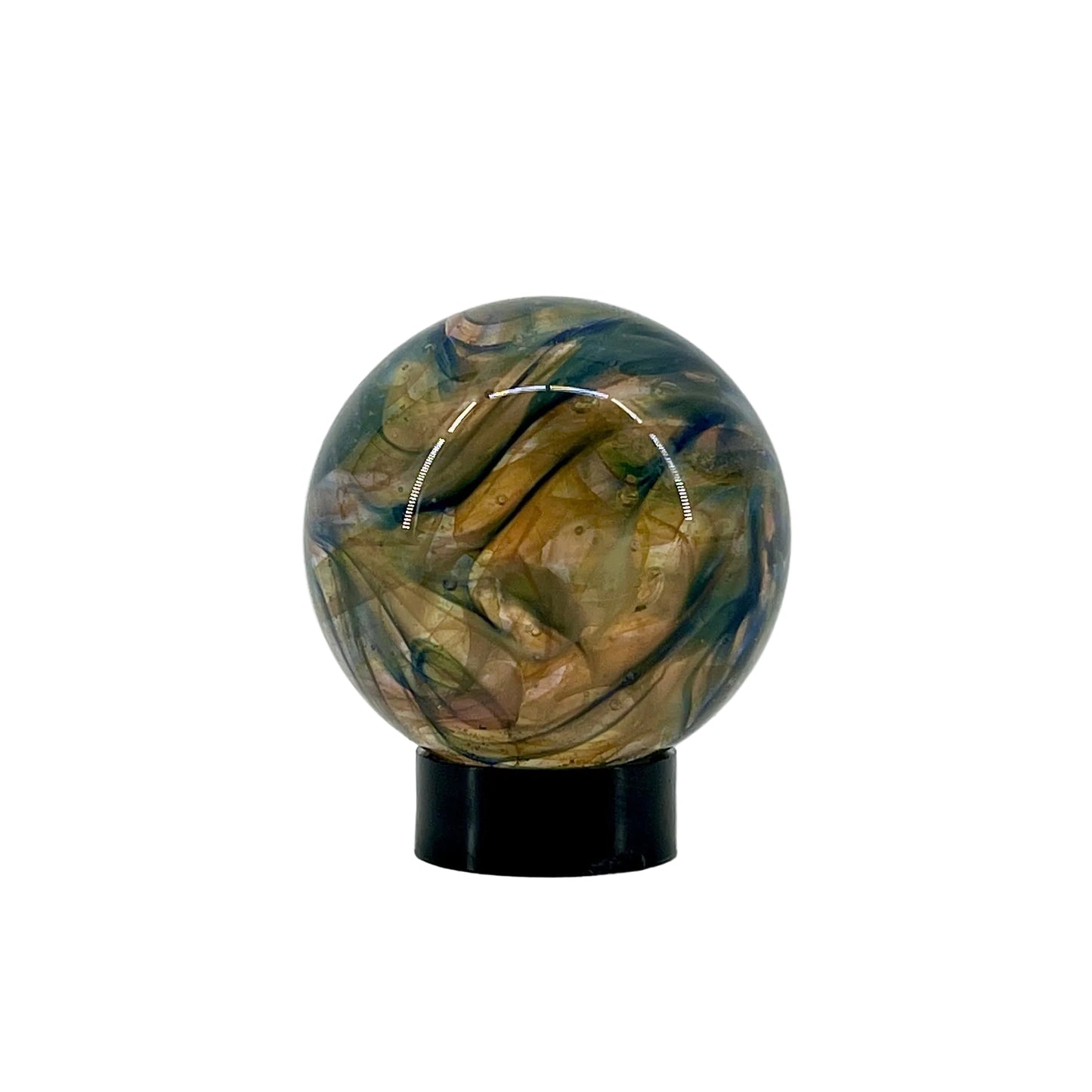 Decorative glass sphere with a black base on a white background