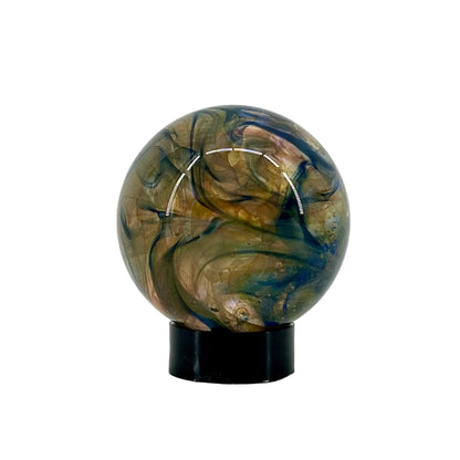Marbled sphere on a stand against a white background