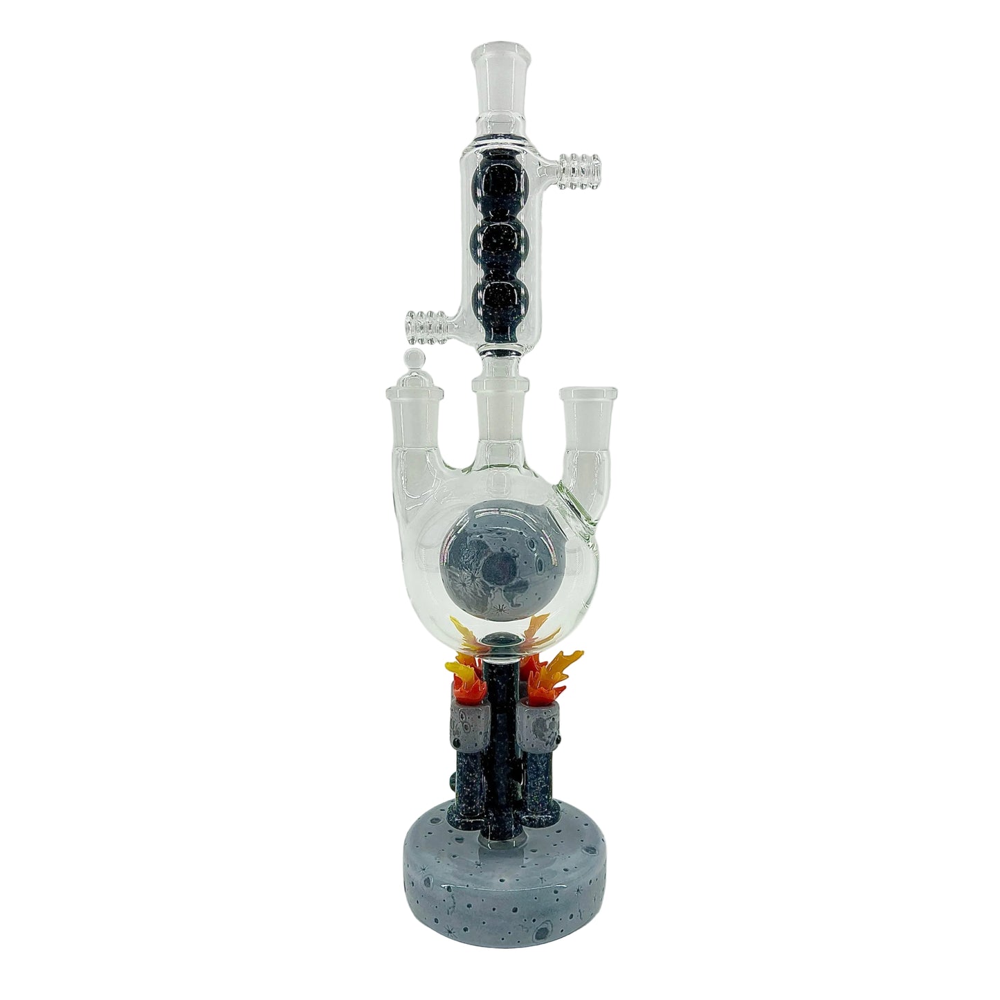 Glass water pipe with moon sculpted base on a white background.
