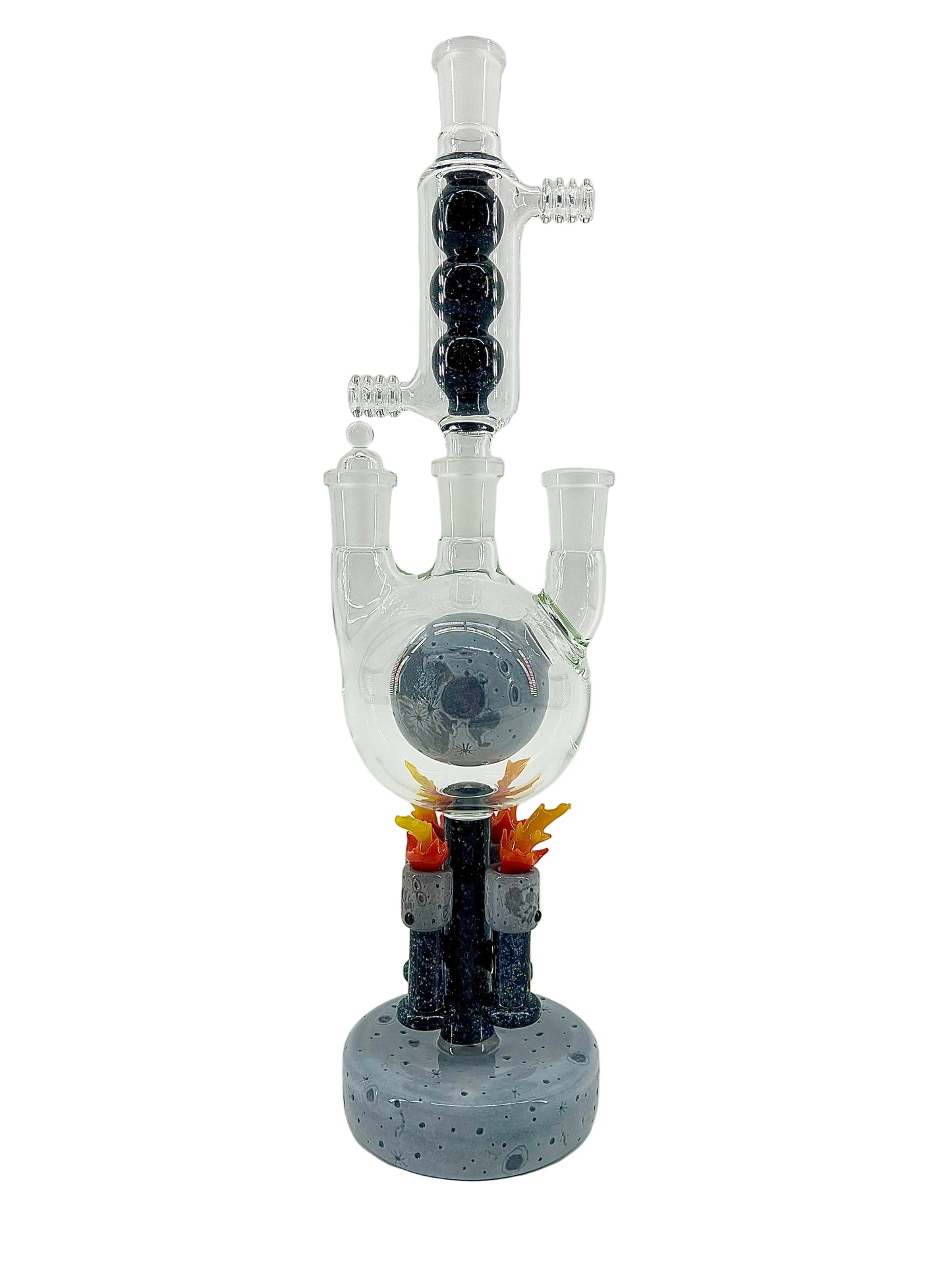 Glass smoking device with sculpted moon base on a white background