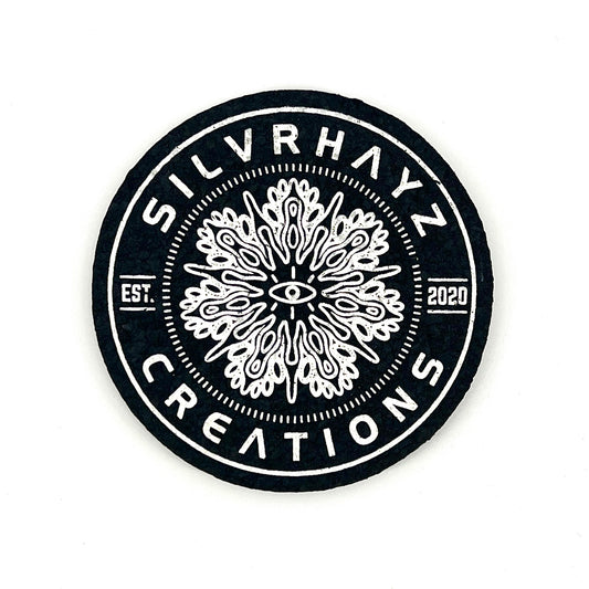 Black and white logo of Silvrhayz Creations with intricate design and text on a white background.