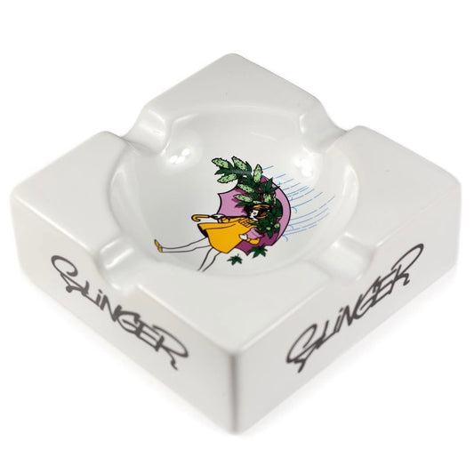 White ceramic ashtray with a decorative design and 'Slinger' branding on a white background.