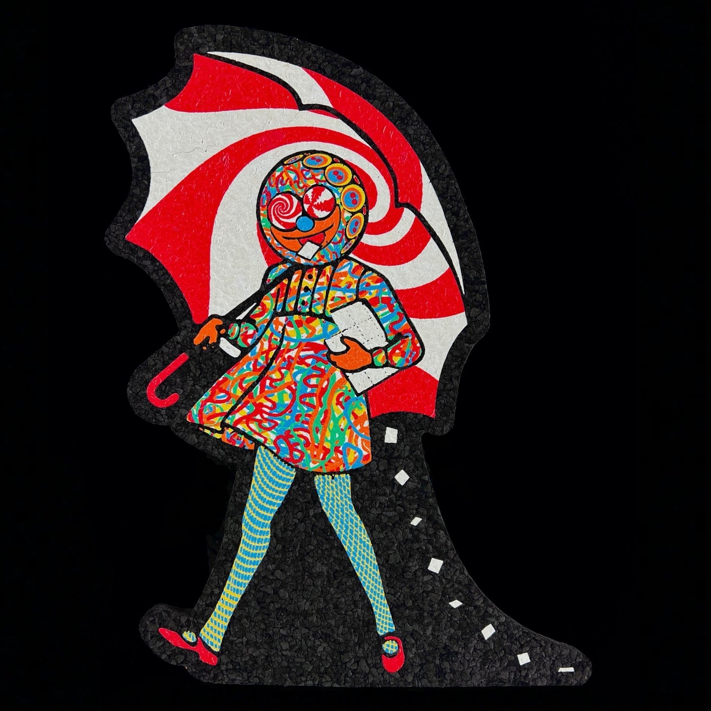 A colorful mat featuring a stylized, abstract character with a red and white umbrella.