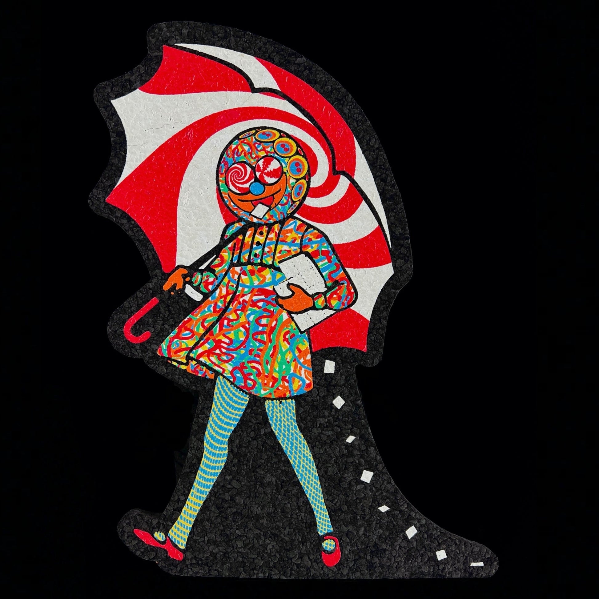 A colorful mat featuring a stylized, abstract character with a red and white umbrella.