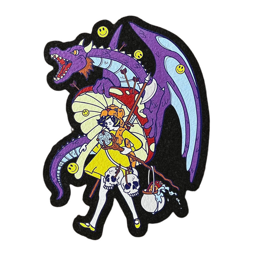 A colorful door mat featuring a cartoon character with a sword, surrounded by a purple dragon-like creature and a skull.