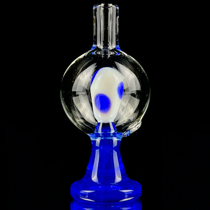 A blue and clear glass piece with a bubble cap.