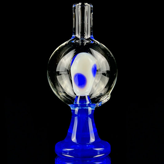 A blue and clear glass piece with a bubble cap.