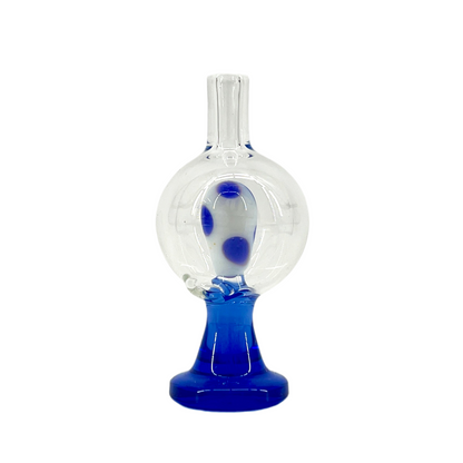 A blue and clear glass bubble cap with a thick glass base and a rounded top.
