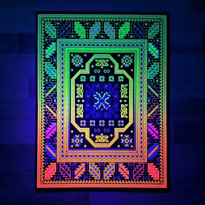 Decorative mat with glowing geometric patterns on a dark background.