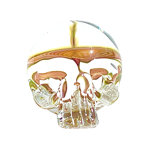 Decorative skull with vortex design on a white background