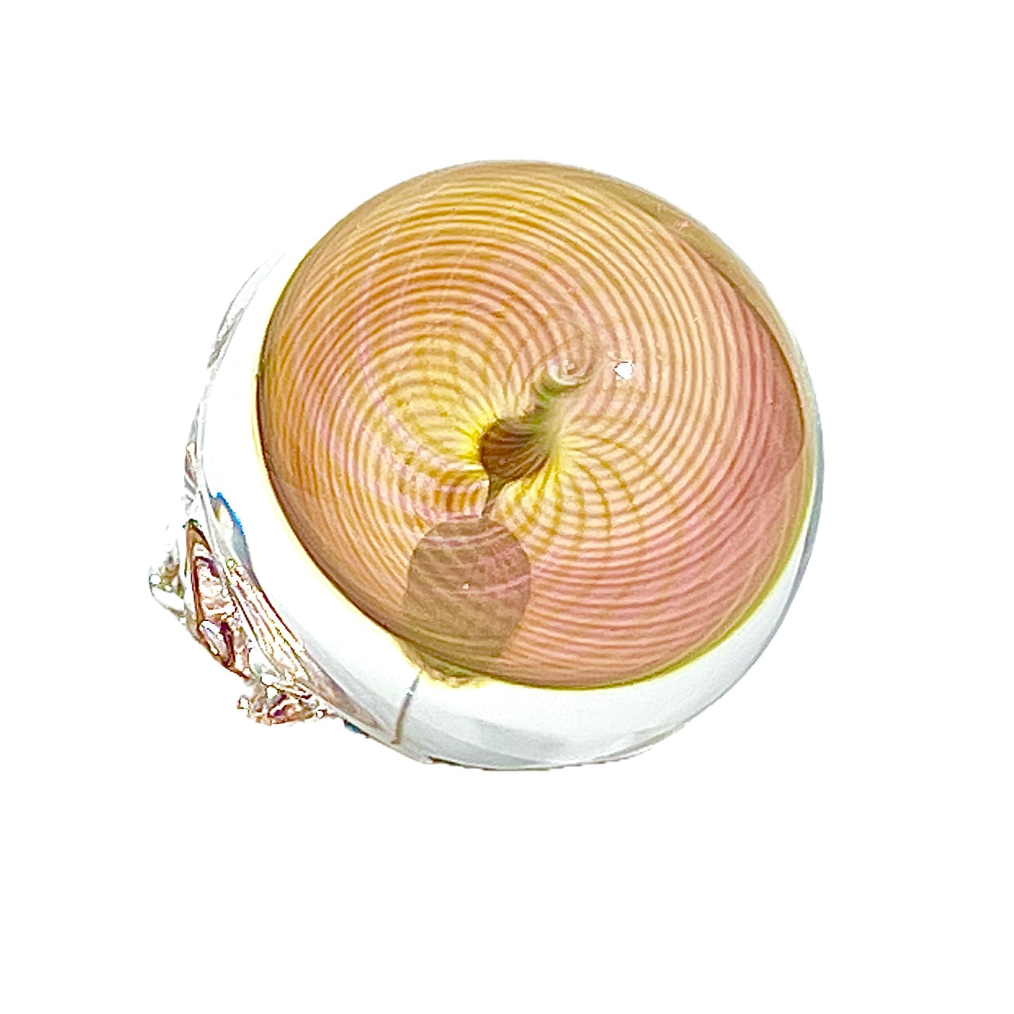 Glass skull with spiral design on a white background