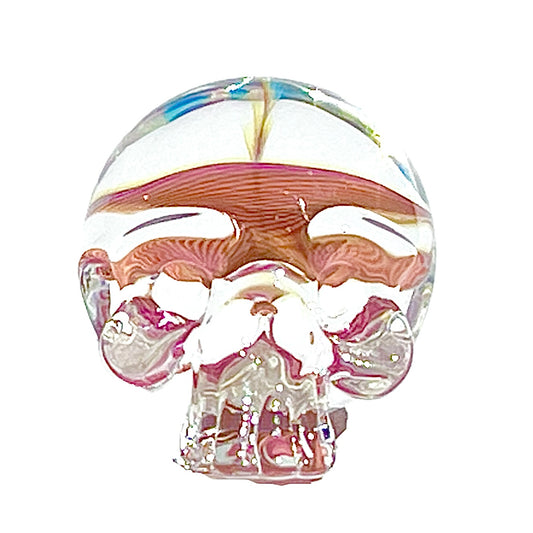 Glass skull with colorful interior on a white background