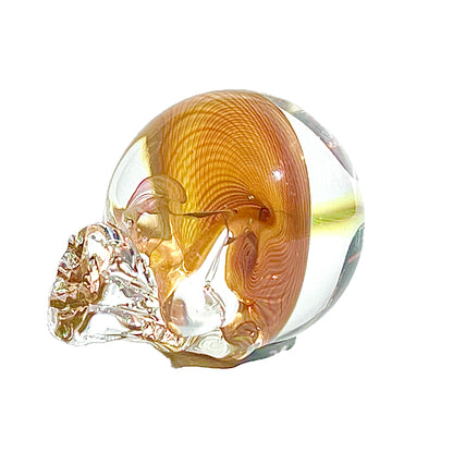 Glass paperweight with a detailed interior design on a white background