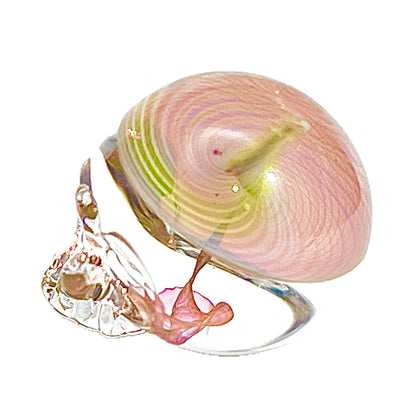 Glass skull figurine on a white background