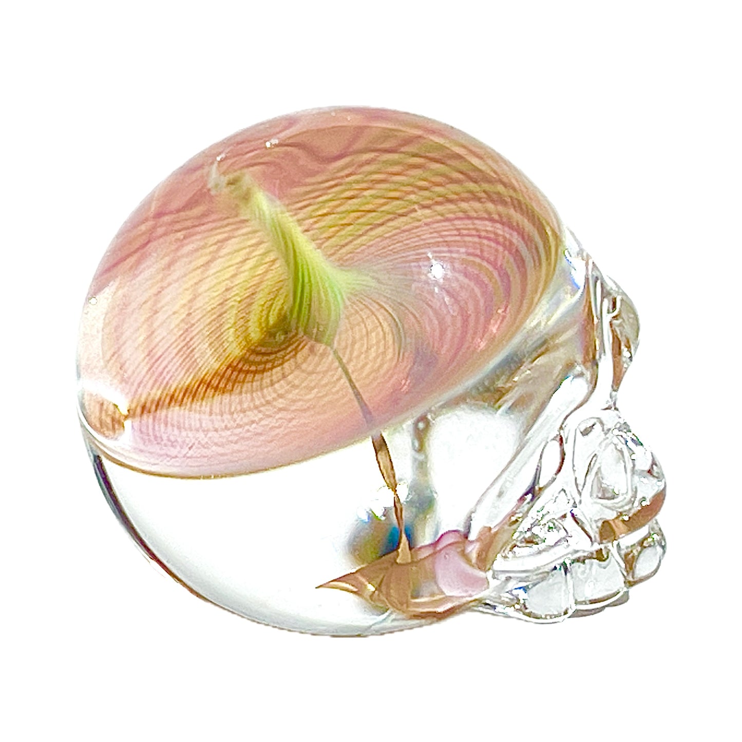 Glass skull with pink and clear design on a white background