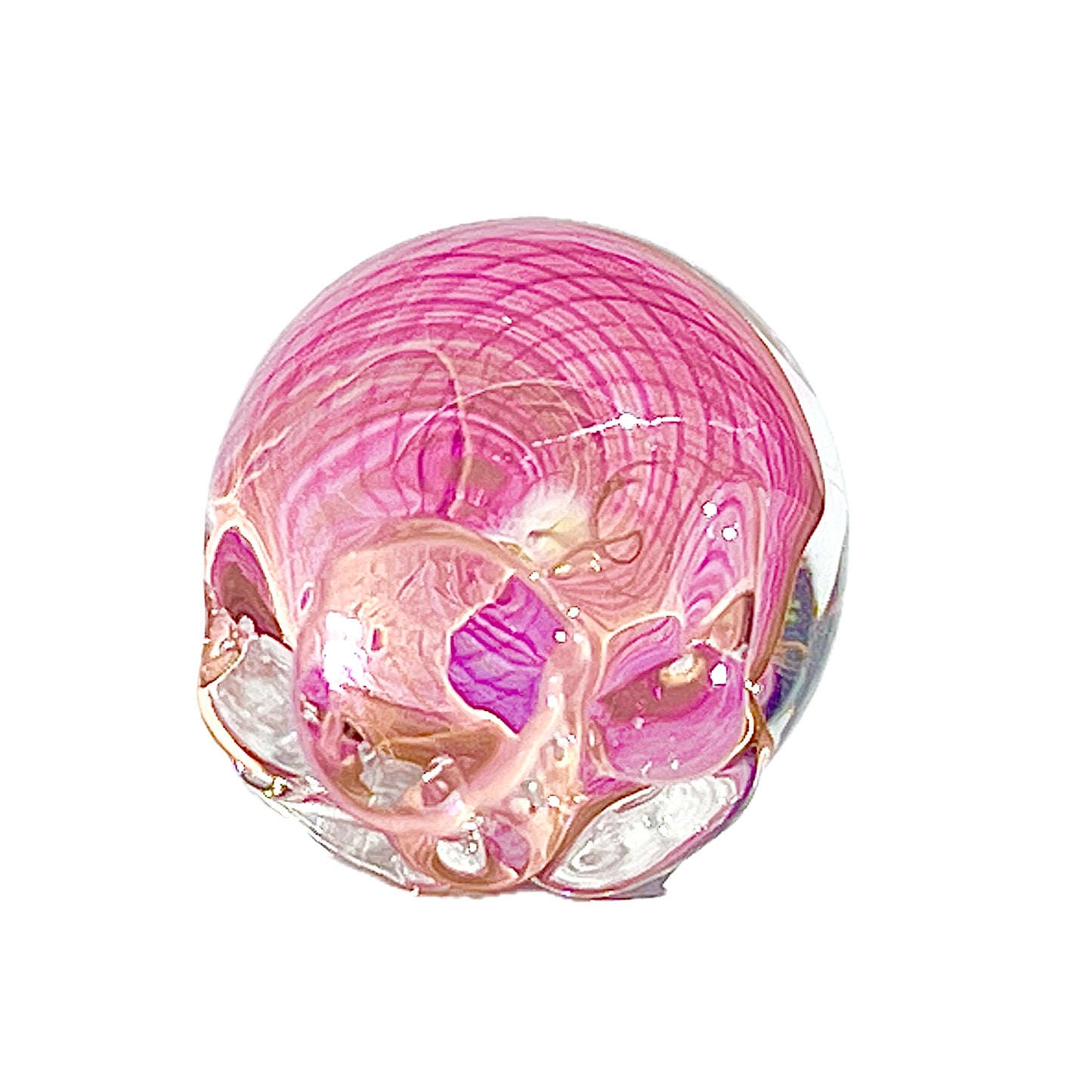 Glass paperweight with pink and clear design on a white background