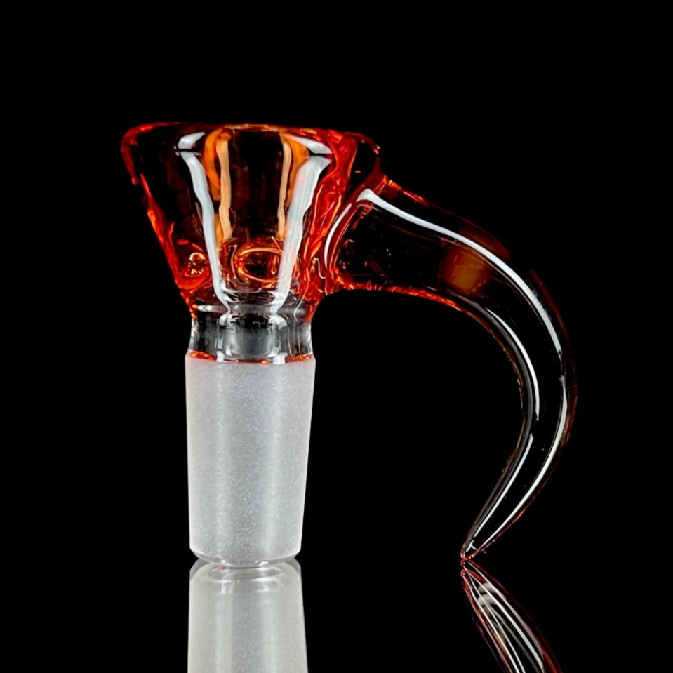 A glass slide with a curved orange bowl attached to a white stem.